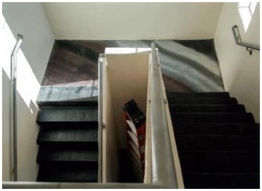 After: view of refinished existing original stair looking down
